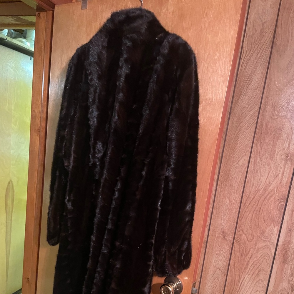 Woman’s black fur coat size medium/large